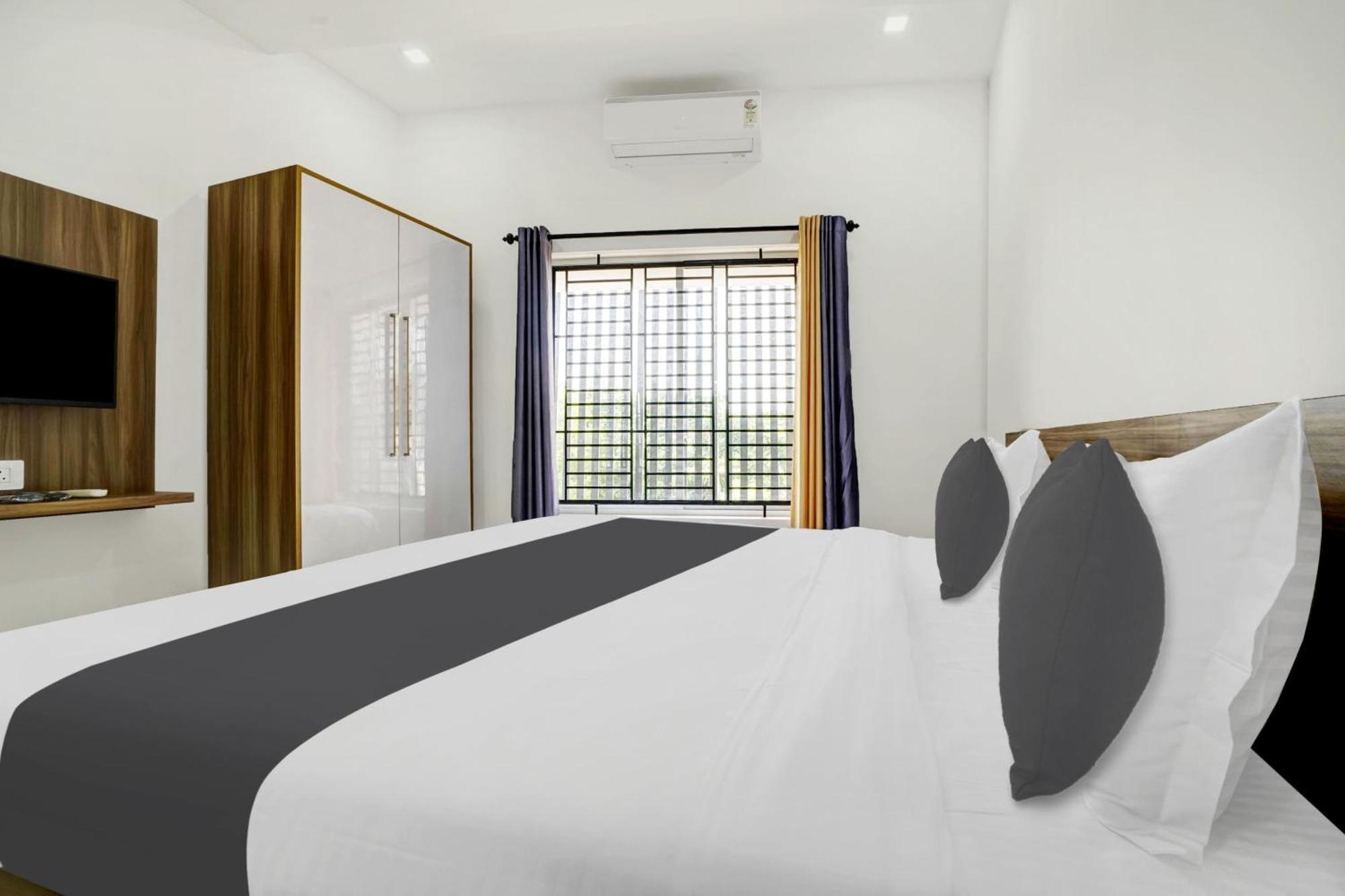 Hotel O Grand Parassini Pāppinisseri Dış mekan fotoğraf